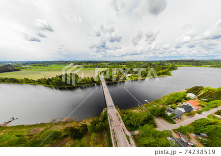 Aerial panoramic view of bridge in city Inkeroinen at river Kymijoki, Finland. 74238519