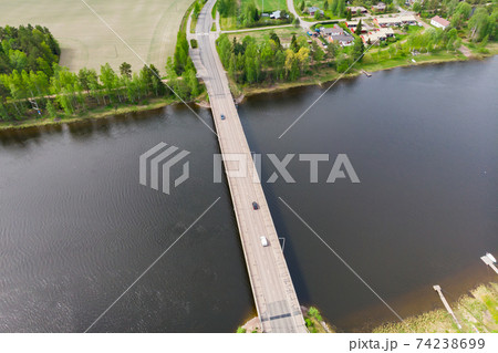 Aerial panoramic view of bridge in city Inkeroinen at river Kymijoki, Finland. 74238699