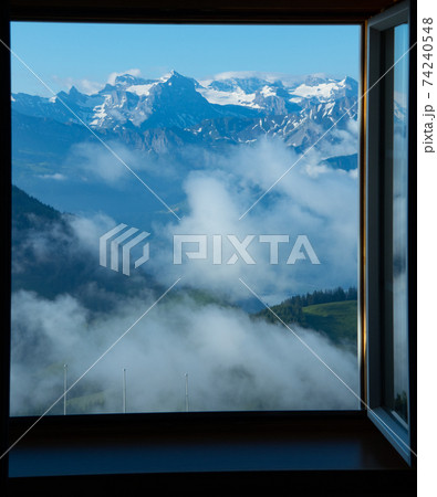 Rigi, Switzerland: Amazing view out of a window towards high mountains 74240548