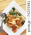 noodles with shrimp and vegetables cooked in Thai style. 74255981