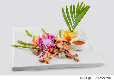 Frog Grill with chilli sauce Frog Grill with chilli sauce 74259796