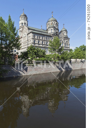 View of the St. John's Stauropegial Convent with a reflection in the river Karpovka 74261000