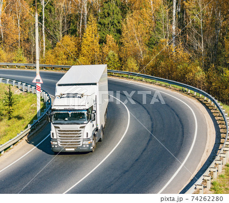 Freight truck moves on the road. 74262280