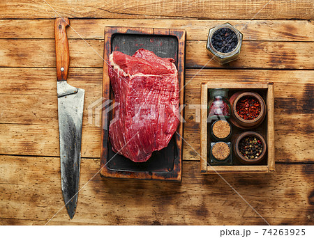 Raw veal meat with seasoning Raw veal meat with seasoning 74263925