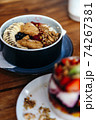 Healthy breakfast with oatmeal bowl 74267381