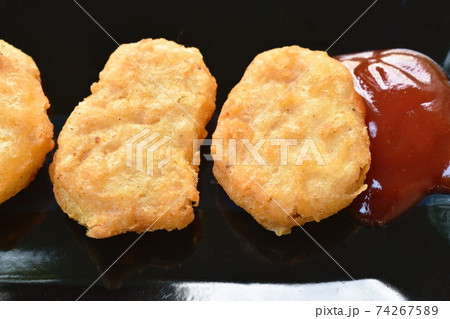 fried chiken nugget meat dipping ketchup on plate fried chiken nugget meat dipping ketchup on plate 74267589