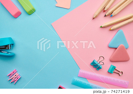 Stationery supplies, blue and pink background Stationery supplies, blue and pink background 74271419