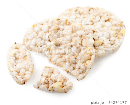 Rice cakes whole and pieces on a white background 74274177