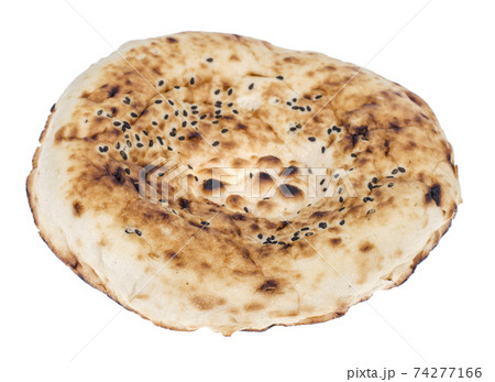 Tandoor flatbread with sesame seeds on white background 74277166