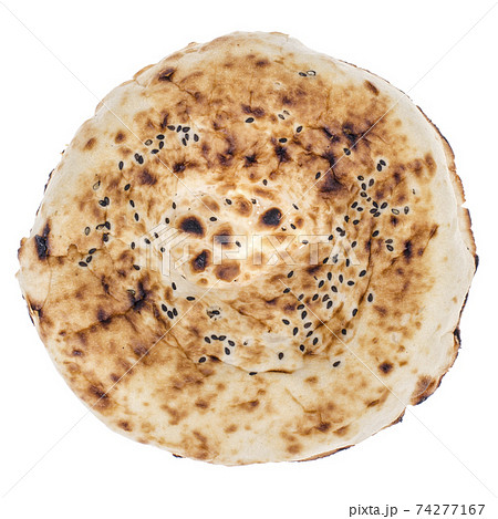 Tandoor flatbread with sesame seeds on white background 74277167
