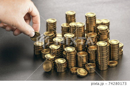 Rich man stacking golden money coins. Income saving plan. Rich man stacking golden money coins. Income saving plan. 74280173