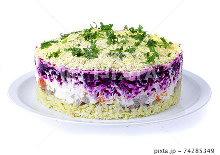 Vegetable salad with beetroot and round herring. Studio Photo 74285349