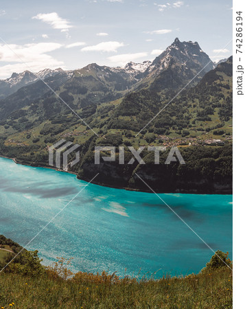 Beautiful high angle view over lake Walen in Sankt Gallen Switzerland Beautiful high angle view over lake Walen in Sankt Gallen Switzerland 74286194