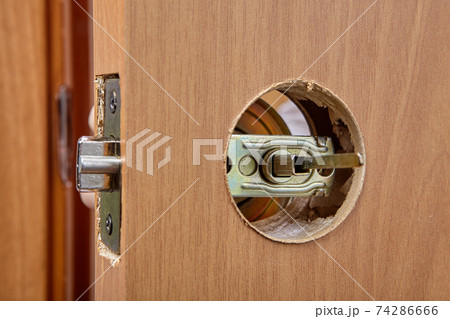 Hole for door knob and latch mechanism with lock during assembly. 74286666