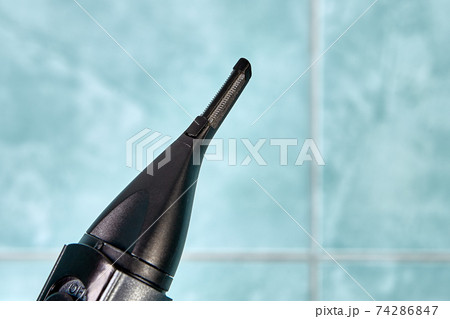Head with blades of cordless trimmer for ears and nostril. Head with blades of cordless trimmer for ears and nostril. 74286847
