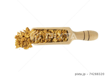 Crispy fried onion flakes in wooden scoop Crispy fried onion flakes in wooden scoop 74288320