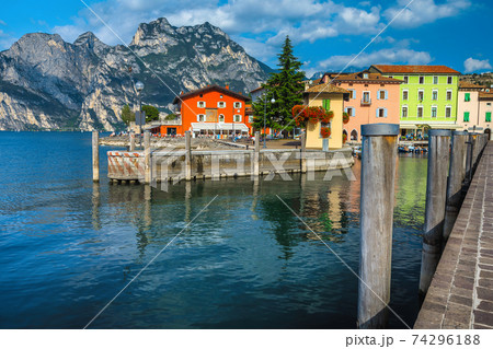 Small harbor and walkway in Torbole, lake Garda, Italy 74296188