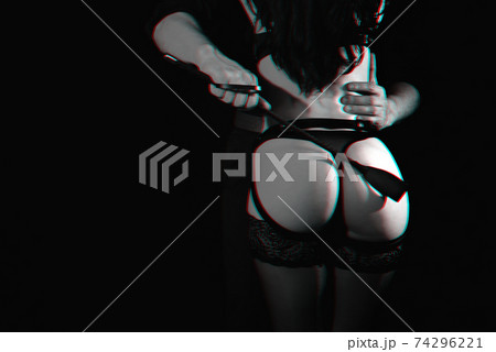 A Man Spanks a Woman with a Leather Whip while Sitting on a Bed in Neon  Light. Bdsm. Stock Image - Image of cropped, buttocks: 293433313