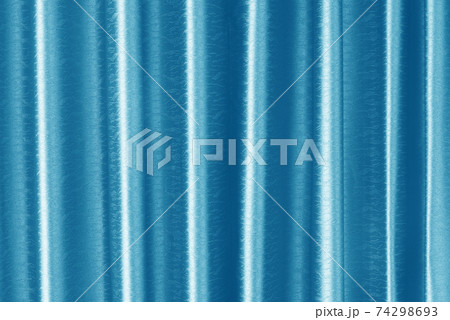 Luxury light blue silk curtain texture for background and design art work. Luxury light blue silk curtain texture for background and design art work. 74298693