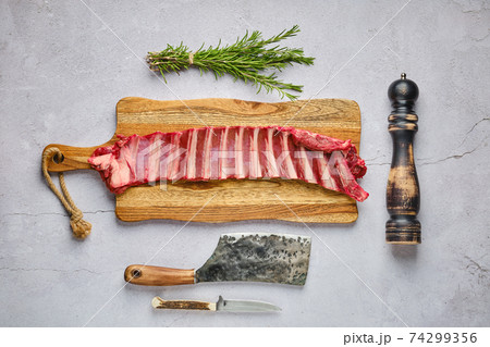 Overhead view of raw fresh deer ribs with spice and herb 74299356