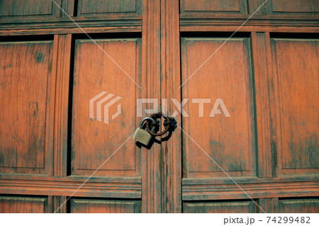 Korean traditional wooden door at Yeongnamnu pavilion in Miryang, Korea Korean traditional wooden door at Yeongnamnu pavilion in Miryang, Korea 74299482