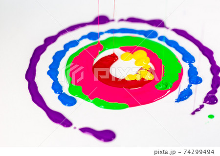 Colors drop in lines on a white background. Colors drop in lines on a white background. 74299494