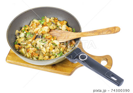 Stewed seasonal vegetables in pan, vegetable stew. Stewed seasonal vegetables in pan, vegetable stew. 74300390