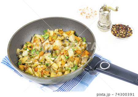 Stewed seasonal vegetables in pan, vegetable stew. Stewed seasonal vegetables in pan, vegetable stew. 74300391