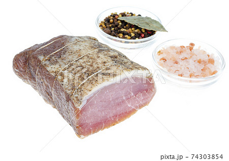 Piece dried pork meat with spices on white background. 74303854