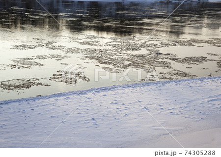 frozen lake in winter cold weather frozen lake in winter cold weather 74305288