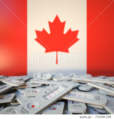 Flag of Canada and disposed COVID-19 antigen tests, coronavirus outbreak conceptual 3D rendering 74306198