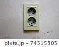 White Electrical Outlet and Wall Plate at the 74315305