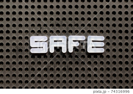 White color letter in word safe on black pegboard background 74316996