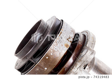 Corrosion and sinkholes on a spent car pump out of order, on a white background, isolate. 74319483