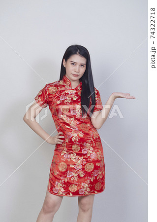 Asian woman wearing traditional cheongsam qipao Asian woman wearing traditional cheongsam qipao 74322718