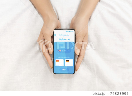 Unrecognizable Lady Learning Foreign Languages Online In Mobile Application On Smartphone 74323995