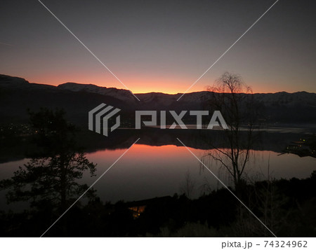 Beautiful sunset view behind the mountains 74324962