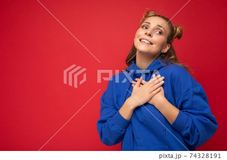 Portrait of young happy positive cute beautiful blonde woman with two horns with sincere emotions 74328191
