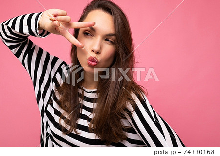 Photo of young european positive delightful happy beautiful brunette woman with sincere emotions Photo of young european positive delightful happy beautiful brunette woman with sincere emotions 74330168