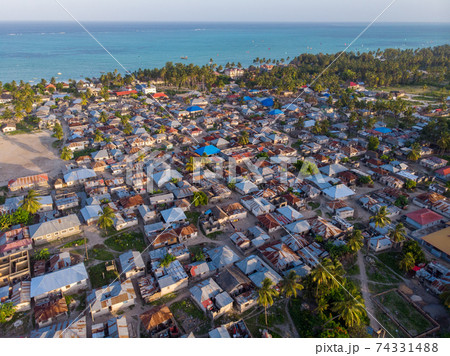 Aerial view on Township Poor Houses favelas in Paje village, Zanzibar, Tanzania, Africa 74331488