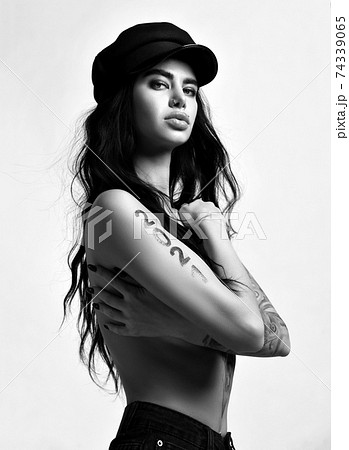 Black and white portrait of naked brunette woman 74339065