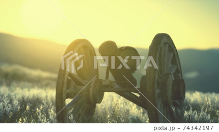 historic war gun on the hill at sunset 74342197