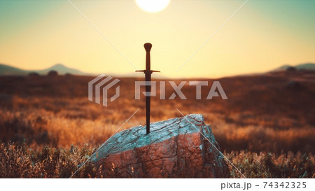 famous sword excalibur of King Arthur in the rock 74342325