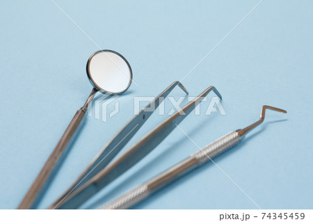 Set of metal dental instruments for teeth dental care Set of metal dental instruments for teeth dental care 74345459