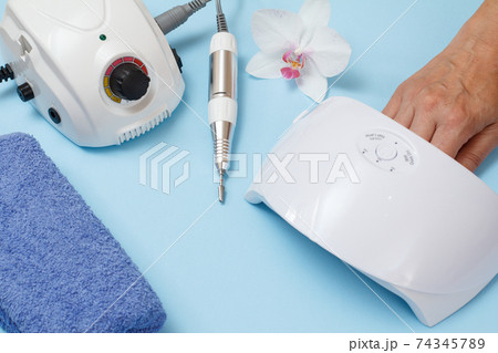 Set of cosmetic tools on a blue background. Set of cosmetic tools on a blue background. 74345789