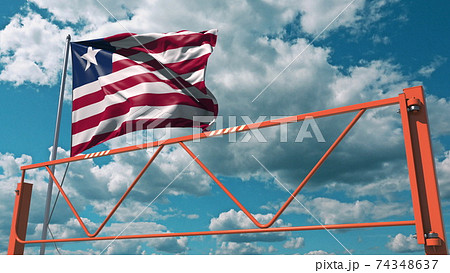 Flag of Liberia and swing arm barrier. Entry ban conceptual 3d rendering 74348637