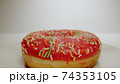 MACRO: Sweet pink donut lies on a white dish, Motion 74353105