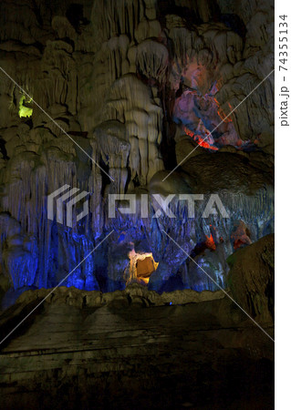 Stalactite and stalagmite formations in a limestone cave of Halong Bay, Stalactite and stalagmite formations in a limestone cave of Halong Bay, 74355134