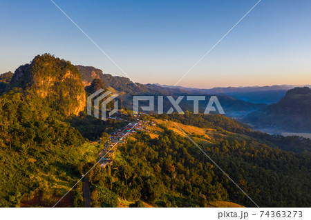 Aerial view of beautiful morning scene of mountain range Aerial view of beautiful morning scene of mountain range 74363273