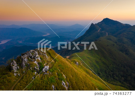 Aerial view of Doi Pha Tang the famous mountain tourist attraction in Chiang Rai province, Thailand Aerial view of Doi Pha Tang the famous mountain tourist attraction in Chiang Rai province, Thailand 74363277